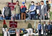DC B’pora hands over sports items to YSS officers for Gurez Youth