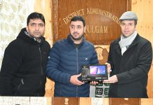 DC Kulgam distributes Tabs among field functionaries of Rev Deptt