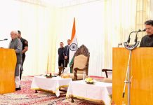 LG Sinha administers oath to Shantmanu as J&K State Election Commissioner